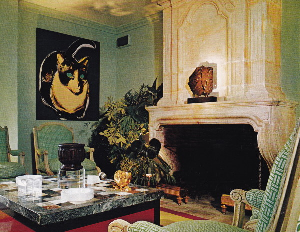 Another view of the salon at Le Clos Fiorentina designed by David Hicks features a painting of a cat by Andy Warhol.