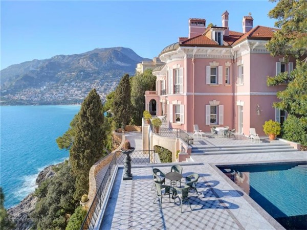 The Belle Epoque Villa Les Rochers in Roquebrune-Cap-Martin on the Cote d'Azur awash in the region's favorite pink.