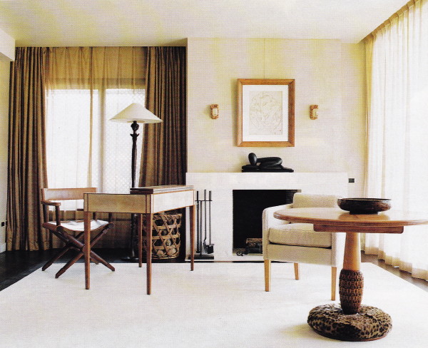 The desk in the master bedroom is by Jean-Michel-Frank; the table and sconces are by Armand Albert Rateau.