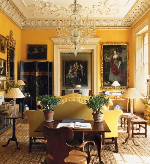 In the tradition of Nancy Lancaster's drawing room at   Jasper Conrad painted his drawing room at Ven House a bright sunflower yellow. Photo by TIm Beddow for The World of Interiors.