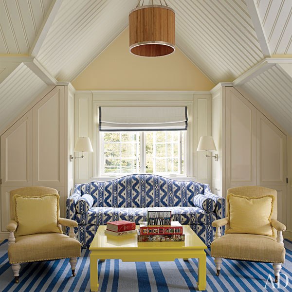 Christopher Maya added shots of yellow to a guest room in the Hamptons home of J. Christopher Burch, also featured in the August issue of AD. Photo by William Waldron.