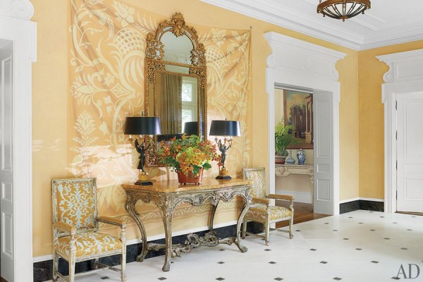 Bunny Williams designed this entrance gallery for a home in Virginia with trompe l’oeil–damask wall panels in 2012. Photo by Pieter Estersohn.