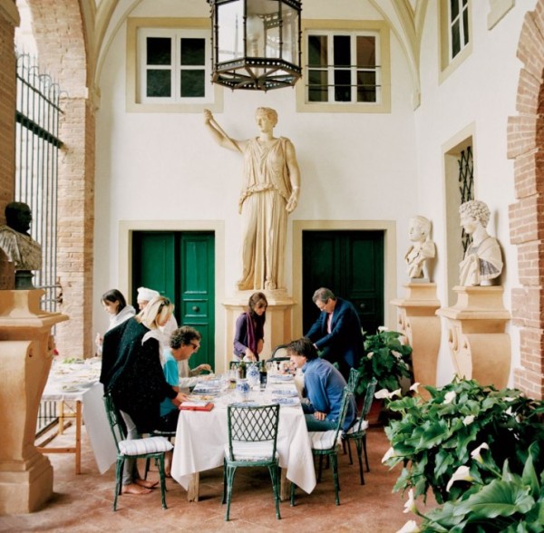 From left, Lily Robinson (at the buffet), Leah De Wavrin, Timmy Hanbury, Marina Lambton, Emma Hanbury, Lord Somerset, and Ned Lambton (standing) in the portico of Villa Cetinale. Photo by Jonathan Becker.