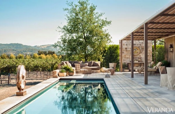 Richard Halberg created a rustic chic environment for the pool terrace of a home in Napa Valley. Photo by Max Kim Bee.