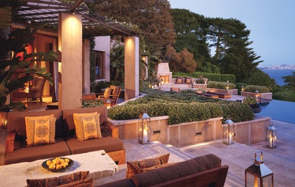 Restoration Hardware chairman, CEO and president Gary Friedman and his wife, designer Kendal Agins Friedman collaborated with architect Howard Backin on the design of their expansive outdoor living areas for their home in Belvedere, California. AD October 2008.