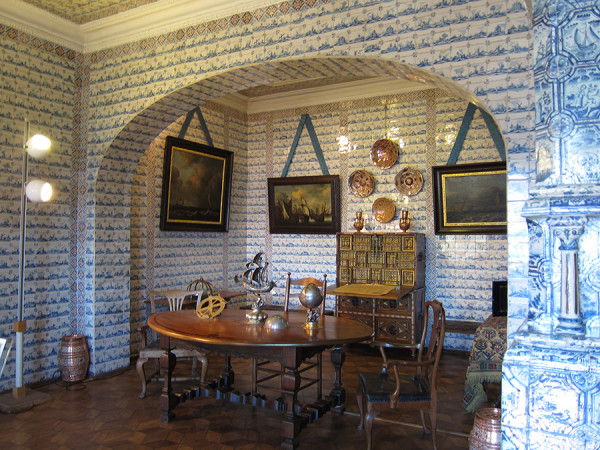 The blue-and-white Dutch tiles line the walls of a reception room at Menshikov Palace in St. Petersburg.