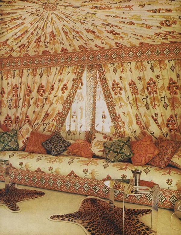 1970: Valentino’s Roman penthouse boasts a Turkish tent alcove with motifs the designer selected from a Persian art book, redrawn and printed on linen. Photographed by Horst P. Horst, Vogue, April 1970.